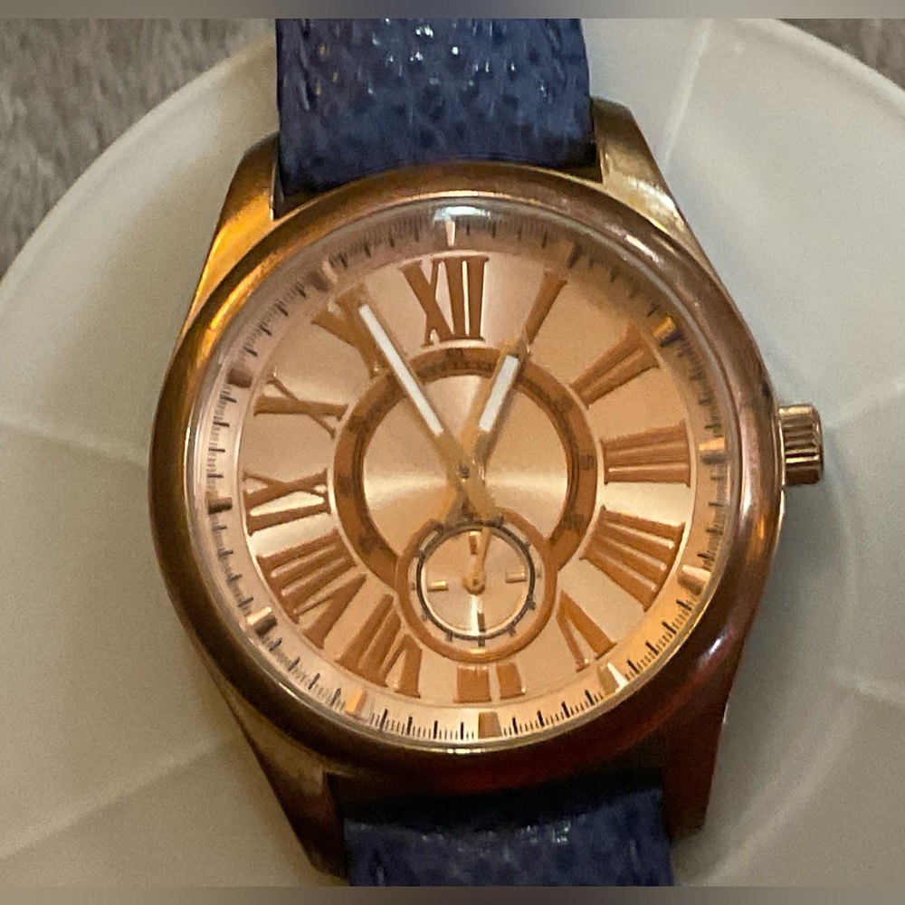 Bronzo Italia: woman’s rose/gold/tone Roman numerals numbers boyfriend watch.